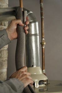 Installing Water Pipe Insulation 104102786