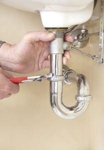 Plumber-Fixing-Sink-Drain_96925837